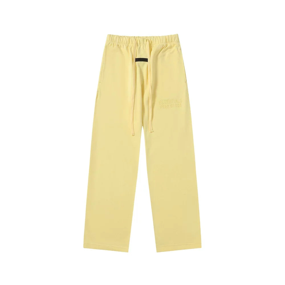 Fear Of God Essentials Tone‑on‑Tone Text Logo Straight‑Leg Sweatpants Pastel Yellow